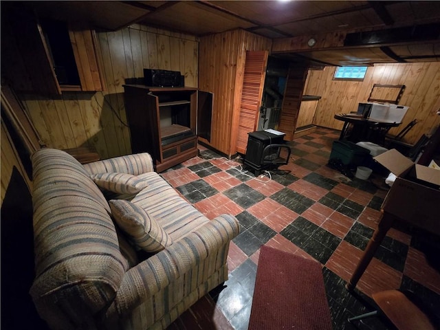 living room featuring wood walls