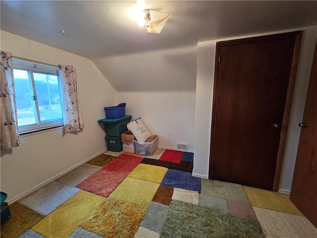 additional living space with lofted ceiling