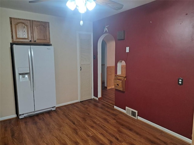 kitchen with dark hardwood / wood-style flooring and white refrigerator with ice dispenser