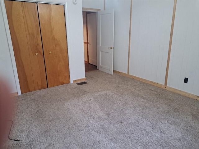 unfurnished bedroom featuring carpet flooring