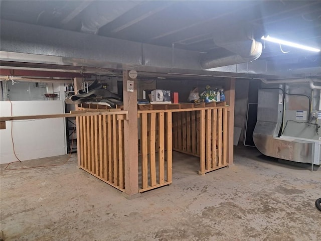 basement featuring heating unit