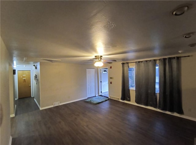 interior space with dark hardwood / wood-style flooring