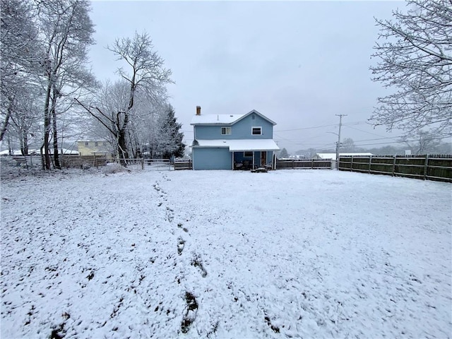 view of snow covered property