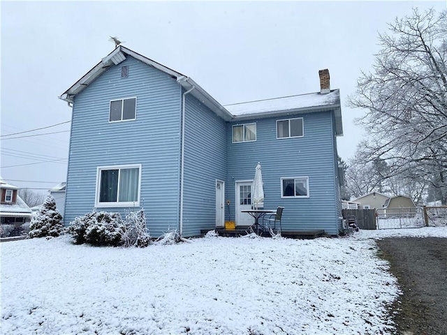 view of snow covered property