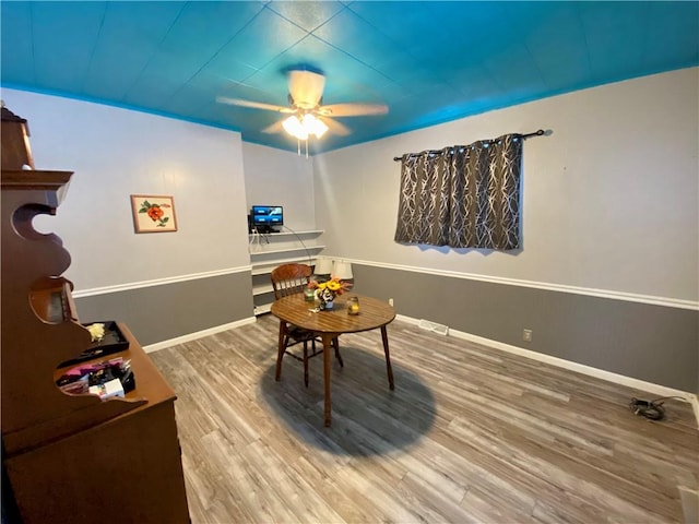 interior space featuring ceiling fan and hardwood / wood-style flooring