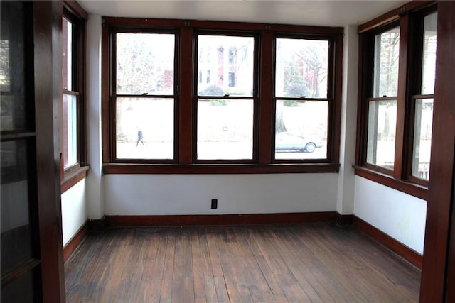 unfurnished sunroom featuring a healthy amount of sunlight