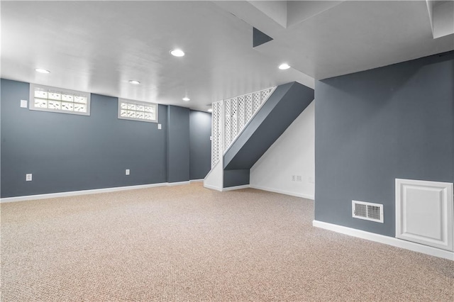 basement with carpet floors