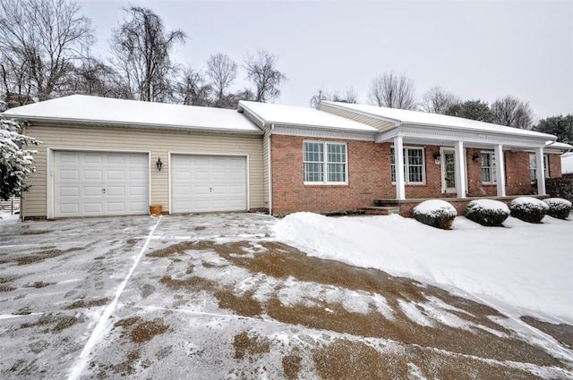 single story home with a garage