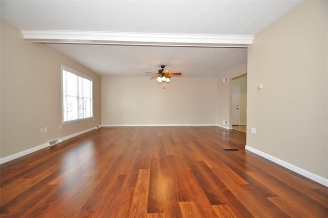 spare room featuring ceiling fan and dark hardwood / wood-style flooring