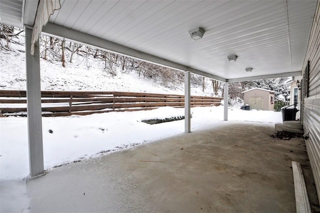 view of snow covered patio