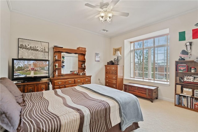 bedroom with light carpet, ceiling fan, and ornamental molding