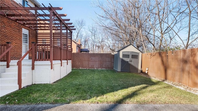 view of yard with a storage unit and a pergola