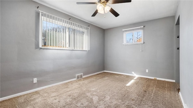 carpeted empty room with ceiling fan