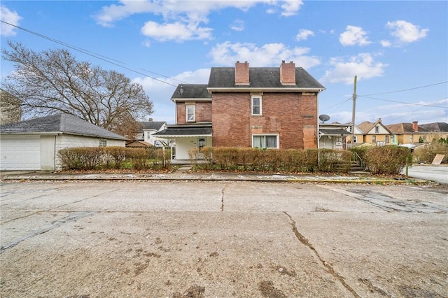 view of side of property featuring a garage