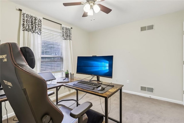 office with light colored carpet and ceiling fan