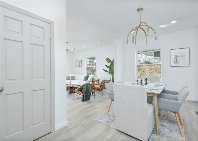 520 Washington St, Bentleyville, PA 15314 - dining area with a chandelier, light wood finished floors, and recessed lighting