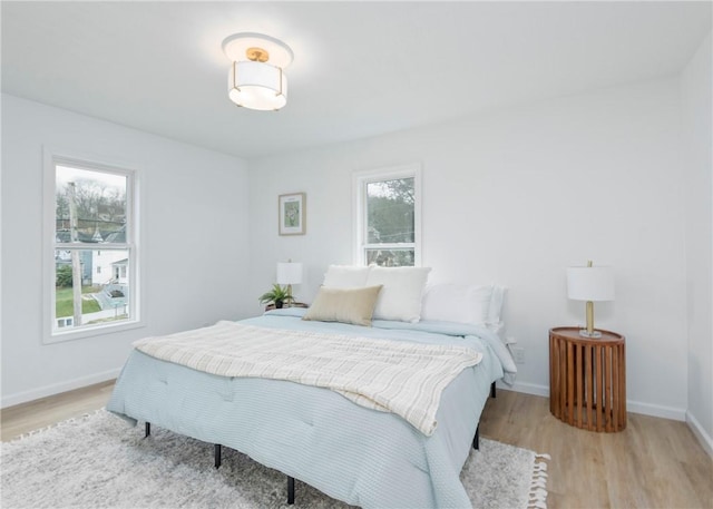 bedroom featuring light wood-type flooring