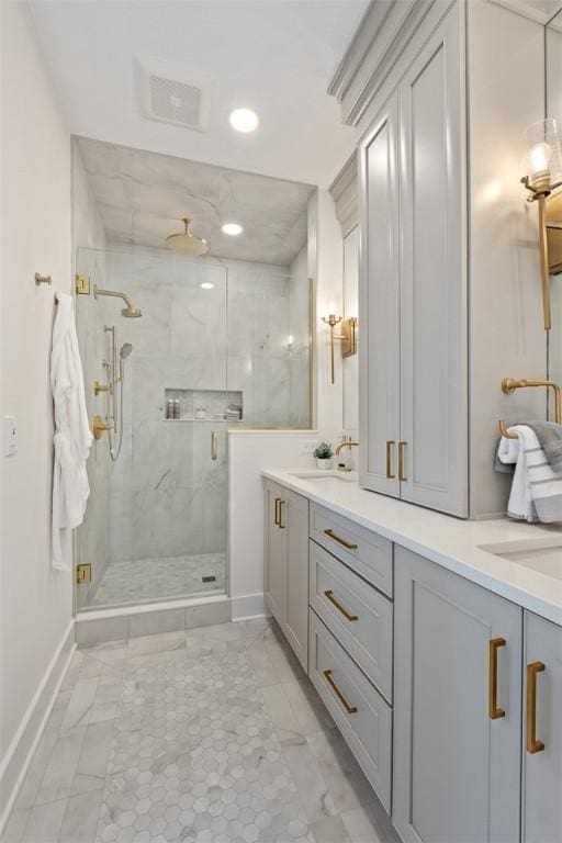 bathroom with vanity and walk in shower