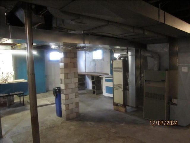 basement featuring heating unit