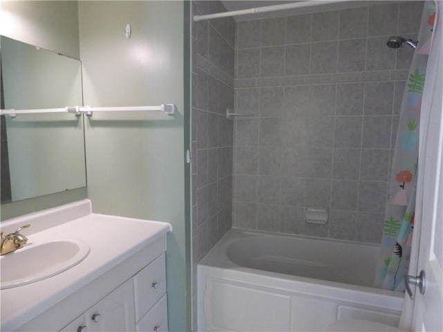 bathroom featuring vanity and shower / bath combo