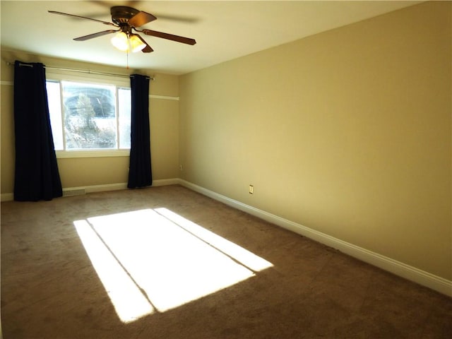 unfurnished room featuring carpet flooring and ceiling fan