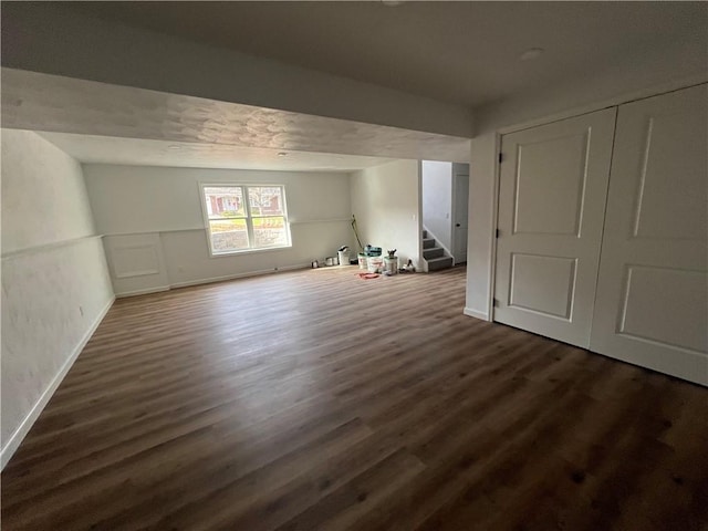 interior space with dark hardwood / wood-style flooring