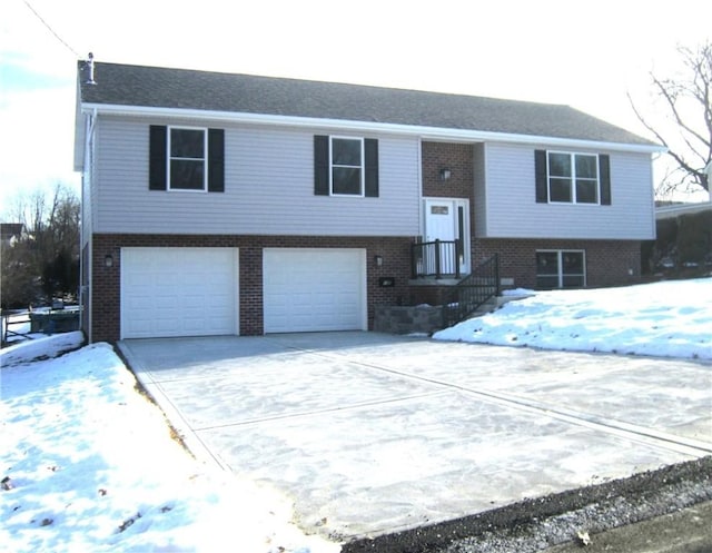 raised ranch featuring a garage