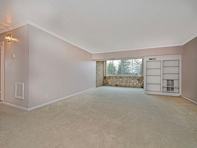 unfurnished living room with light colored carpet and crown molding