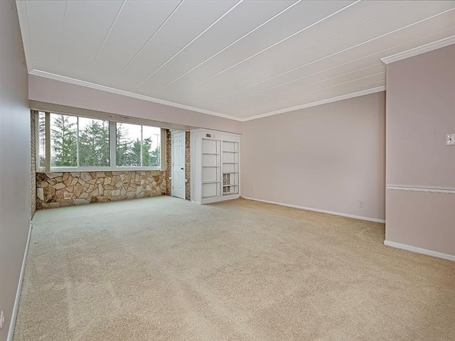 interior space with light carpet and crown molding