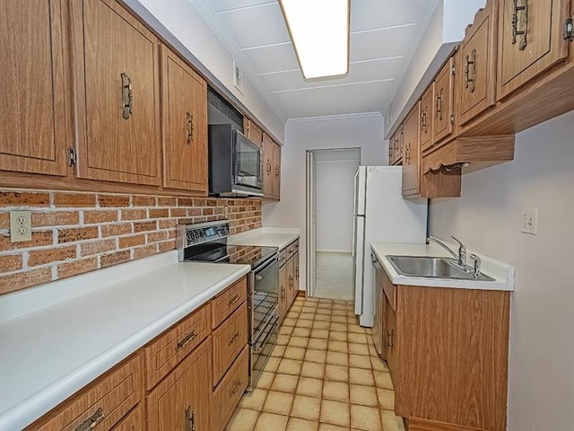 kitchen featuring black appliances and sink