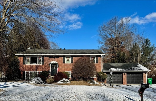 bi-level home featuring a garage