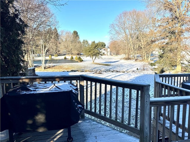 view of snow covered deck