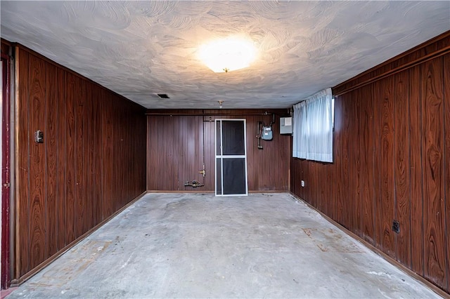 basement with wood walls