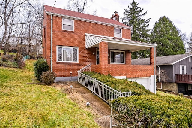 view of front of property featuring brick siding, a chimney, and a front lawn