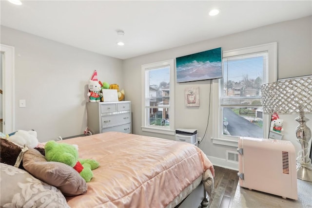 bedroom featuring hardwood / wood-style flooring