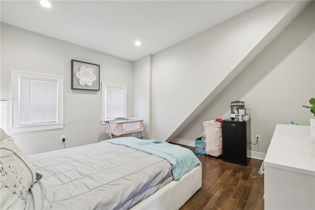 bedroom featuring dark wood-type flooring