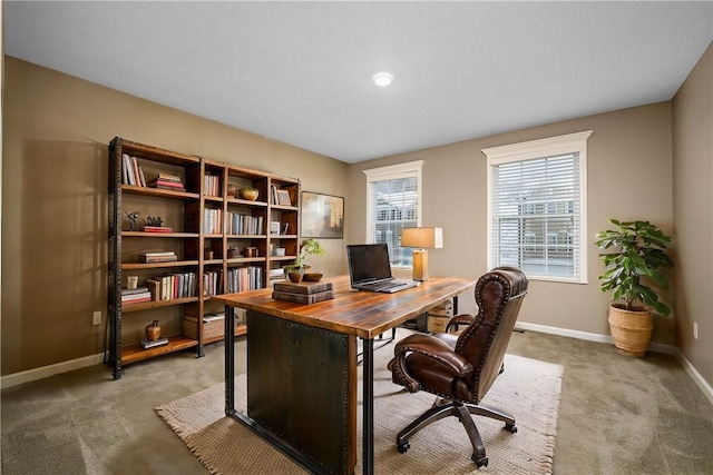 view of carpeted office space