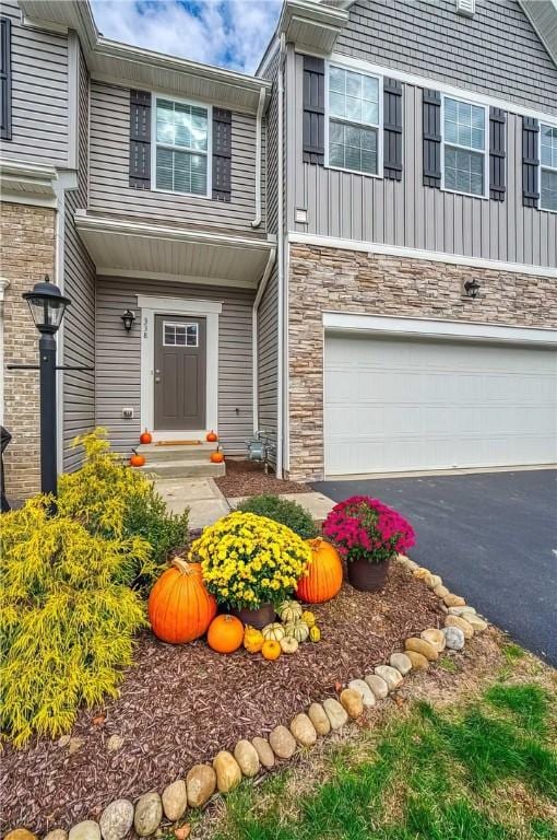 view of front of property with a garage