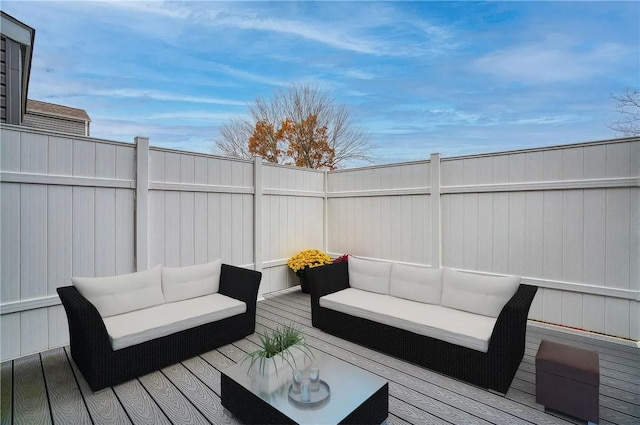 wooden terrace with outdoor lounge area