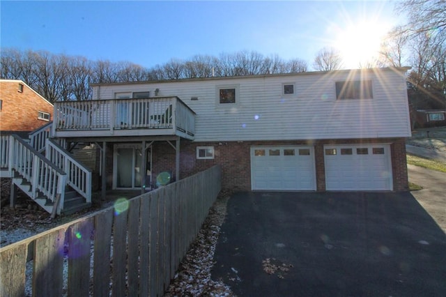 rear view of house with a deck