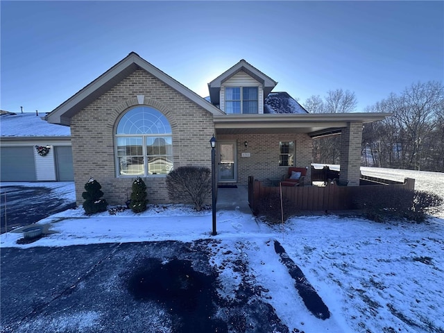 view of front of property featuring a garage