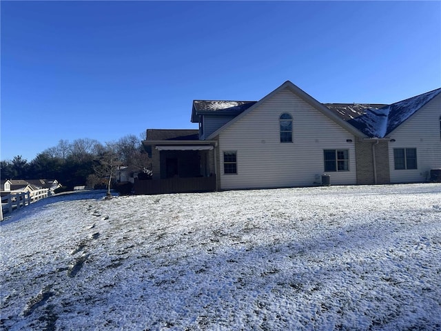 view of snow covered property