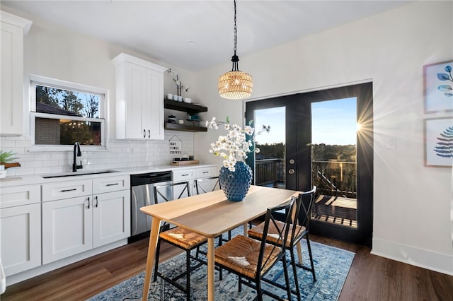 1940 Warriors Rd, Banksville/Westwood, PA 15205 - dining area with french doors, dark wood finished floors, and a chandelier