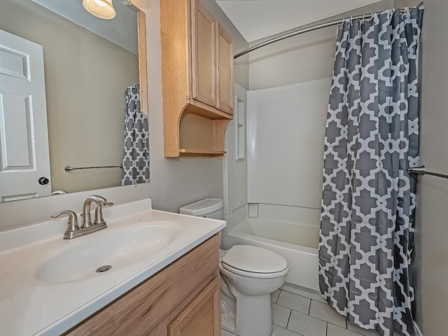 full bathroom with tile patterned flooring, vanity, toilet, and shower / bath combo