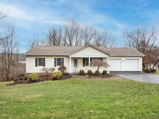 single story home with a front yard, a garage, and covered porch