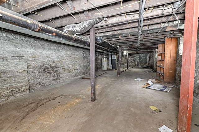 basement with heating unit and water heater