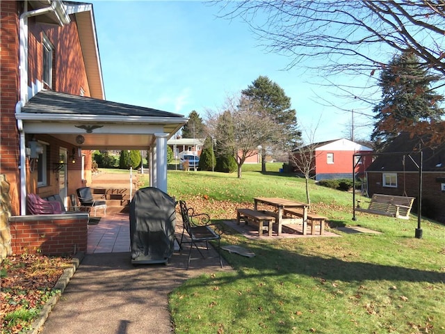 view of yard featuring a patio