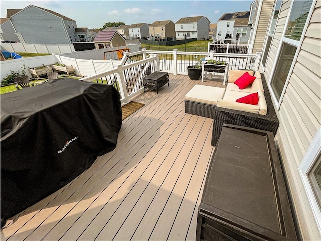 wooden terrace with grilling area