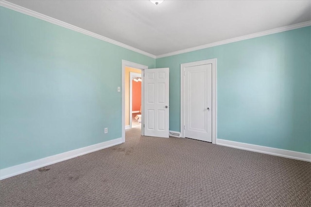 unfurnished bedroom with carpet flooring and ornamental molding