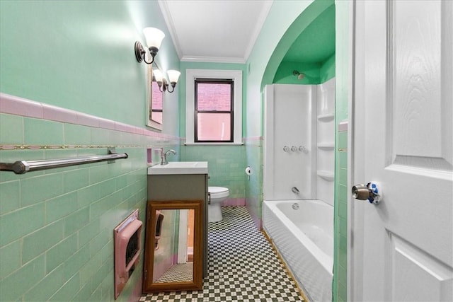 full bathroom with bathing tub / shower combination, crown molding, toilet, vanity, and tile walls